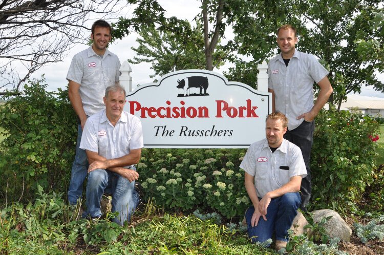 The Russcher family operates multiple farms, including under the Precision Pork umbrella. (Top row, from left: Lewie and Jeremy Russcher. Bottom row, Dennis and Jeff Russcher). 