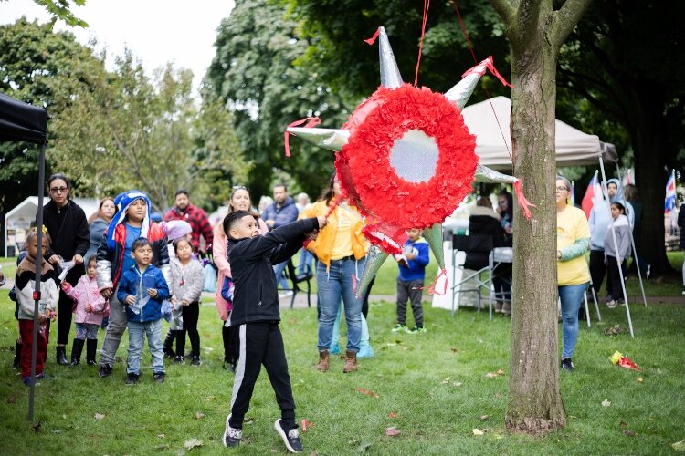 Children hit a pinata during the 2022 Grand Haven Hispanic Heritage Fiesta.