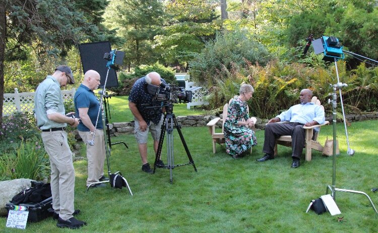 Cinematographer Tyler Joslin with crew members Kirk Wahamaki and David Darling, and actors Diane Van Wesep and Edward Gaines during filming.