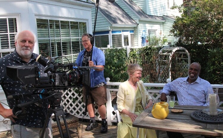 Crew members David Darling and Pete Bosheff with actors Diane Van Wesep (Pim de Wit) and Edward Gaines (Old Tom Johnson) during the filming of Old Heart in Muskegon.