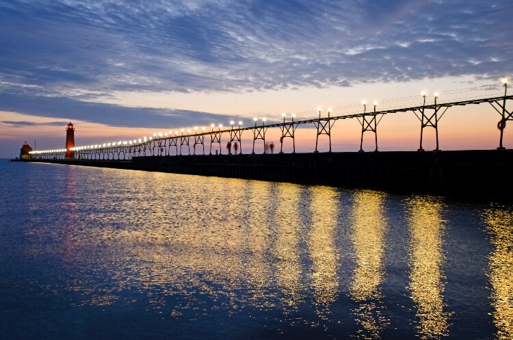 The sun sets on the Grand Haven Catwalk. (Todd Reed)