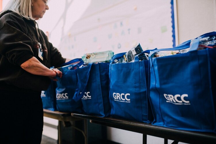 The GRCC food pantry offers curbside distributions to families in need.