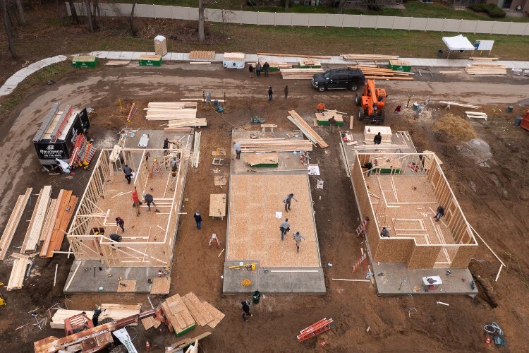 An aerial view shows progress Monday on a Lakeshore Habitat for Humanity Blitz Build on the Vista Green project.