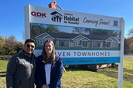 Raul Garcia, Homeowner Services Coach with Brittany Rabideau, a future Haven Townhome homeowner.