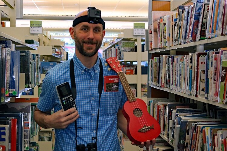 Dan Zuberbier with Herrick District Library shows off a few of the items available for check out through HDL's Library of Things.  (Contributed/HDL)