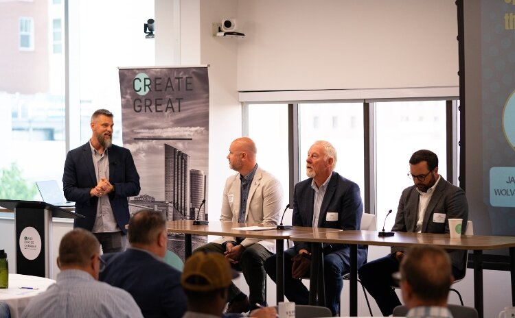 Ryan Kilpatrick, lead consultant for Housing Next, leads a panel discussion. 