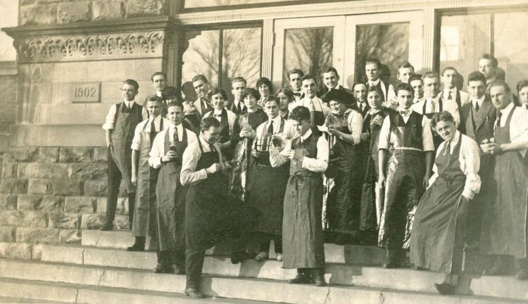 Hope College science students on the steps of van Raalte Hall around the turn of the century.