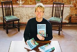 Hopwood DePree with his book, Downton Shabby: One American's Ultimate DIY Adventure Restoring His Family's English Castle.