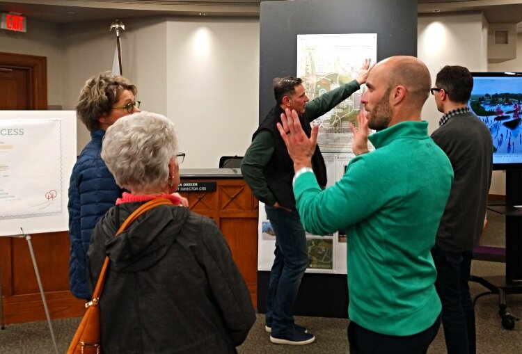 The city of Holland hosted an open house to display ideas gathered from public input for an ice rink at its downtown park, Window on the Waterfront.