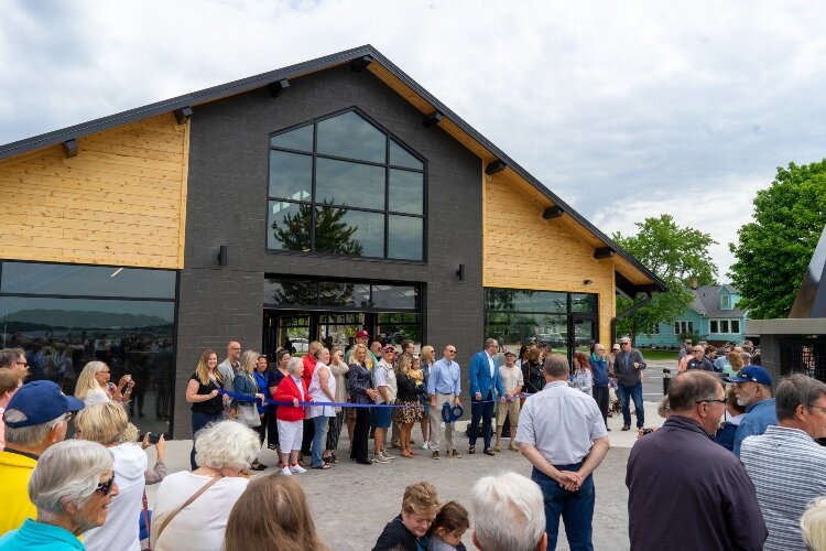 Spring Lake residents gather to watch the ribbon-cutting ceremony for Tanglefoot Park. (Brittany Meyers)