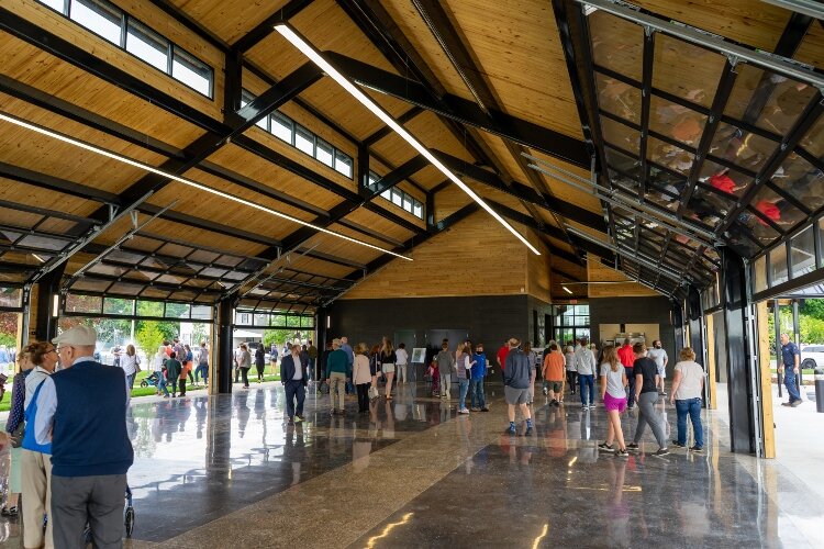 Residents walk through the pavilion at Tanglefoot Park for the first time. (Brittany Meyers)