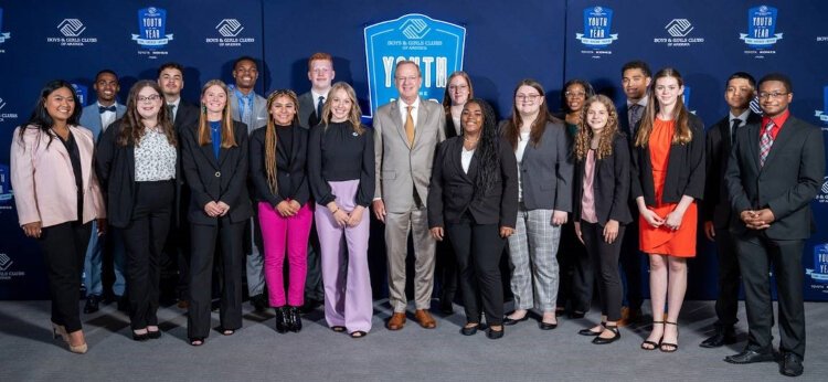 Isabel Shepard (front row, fourth from left) poses with a group at the Boys and Girls Club Midwest Youth of the Year celebration. This week, she will compete for the national title in New York City.