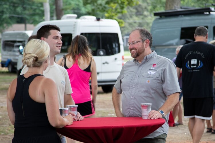 Jack Johnson, Volta co-founder and CTO (right) chats with attendees.