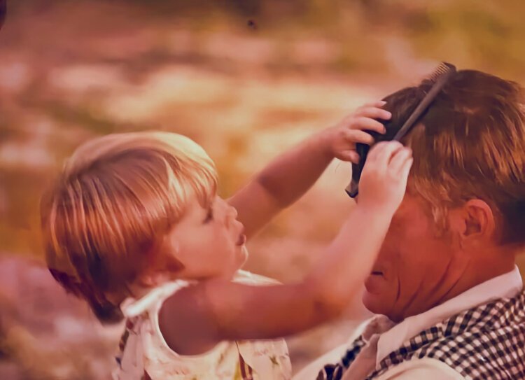 Here is a photo of myself as a foster child with a dear friend who would keep a comb in his shirt pocket and pick me up after church every Sunday and allow me to comb his hair. I have always loved doing hair! 