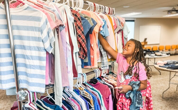 The event stands out by letting families choose items they’re proud to wear, promoting dignity through the power of choice.