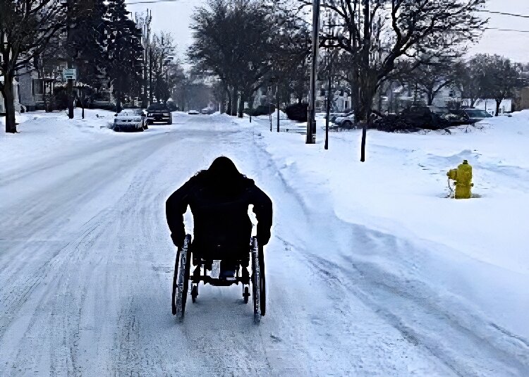 A wintery day when The Lakeshore Disability Inclusion Co-editor Lucia Rios had to roll her wheelchair in the road, because sidewalks hadn't been cleared of snow. 