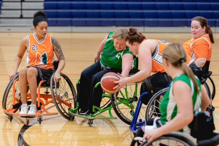The wheelchair basketball league is part of Mary Free Bed's adaptive sports program. Wheelchair users can participate in softball, soccer, fencing, hand cycling, swimming, tennis, and rugby. 