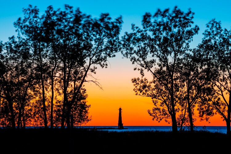 The sun sets on the Grand Haven Catwalk. (Todd Reed)