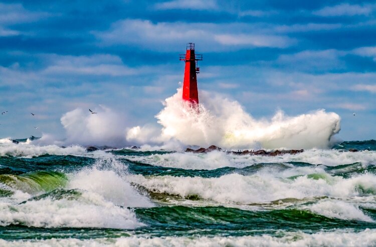A storm slams the Muskegon Lighthouse. (Todd Reed)