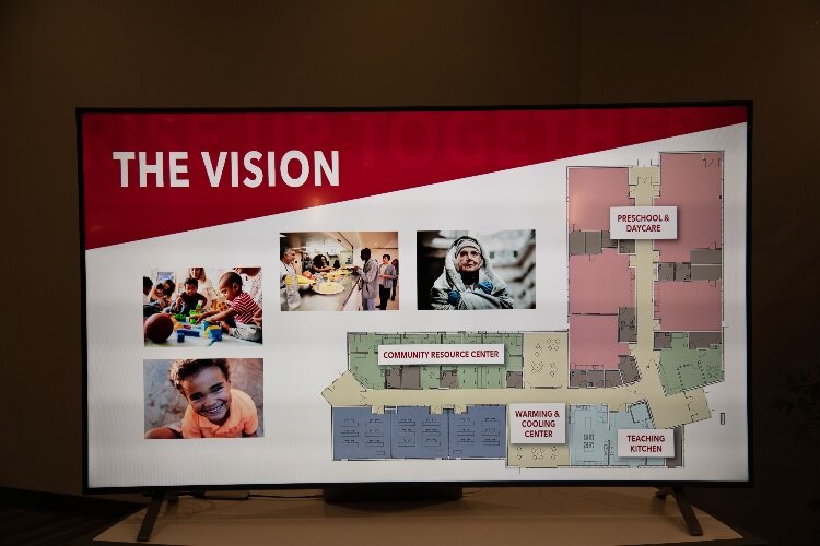 This display shows the building plans for a community resource center in Muskegon.