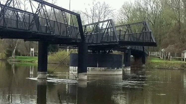 The centerpiece of the historic New Richmond Bridge Park is a fully restored swing bridge that spans 400 feet across the Kalamazoo River.