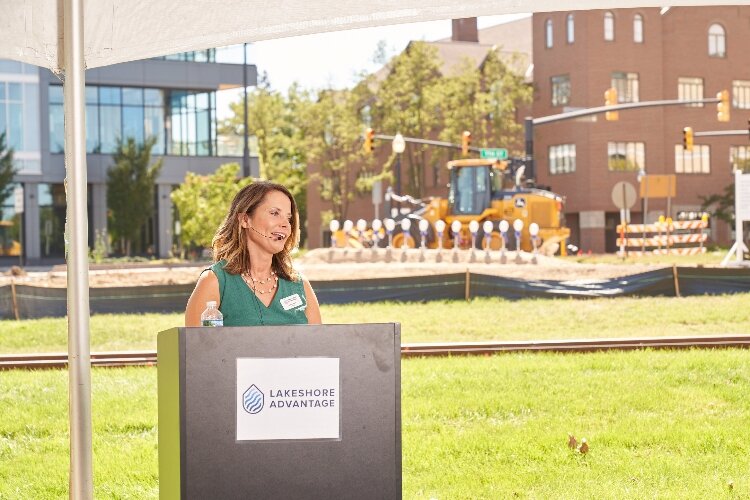 Jennifer Owens, president of Lakeshore Advantage, speaks at the groundbreaking for the Next Center. (Carl, Inc.)
