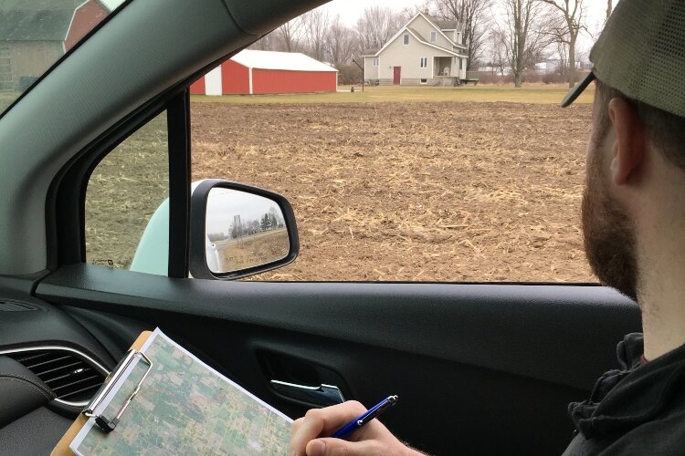 Ottawa Conservation District Watershed Technician Benjamin Jordan conducts a spring tillage survey in Ottawa County.