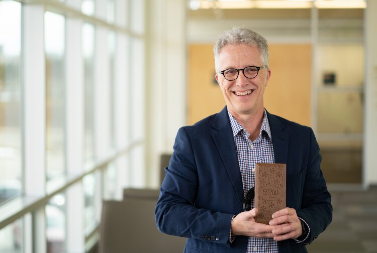 Holland BPW’s Pete Hoffswell was honored as Innovator of the Yearfor the “smart brick” he invented, which collects temperature data throughout the city’s snowmelt system.