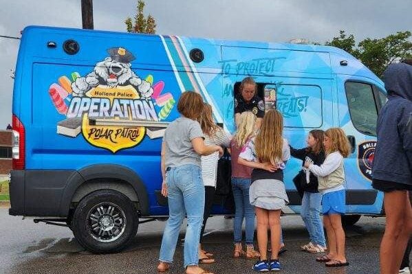 The  the Holland Police Department Polar Patrol provided free ice cream at the Block Party. (Gentex)