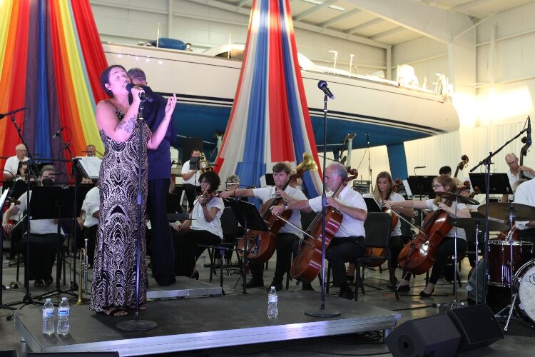 Sydney McSweeney performs with the Holland Symphony Orchestra during their "Pops at the Pier" concert at Eldean Shipyard in Macatawa, Michigan, June 16, 2022.