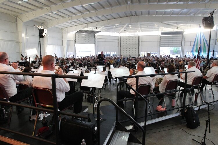 Byron Stripling conducts the Holland Symphony Orchestra during their "Pops at the Pier" concert at Eldean Shipyard in Macatawa, Michigan, June 16, 2022.