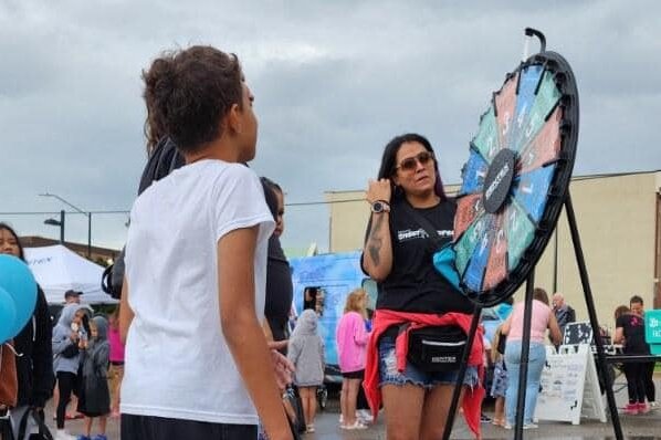 The prize wheel was popular at the Block Party. (Gentex)