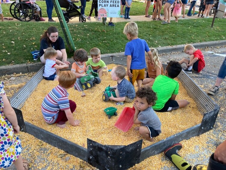 Kids who attended Pumpkinfest enjoyed having their faces painted, climbing on inflatables, riding a barrel train, and playing a variety of fall yard games, including bowling with pumpkins.