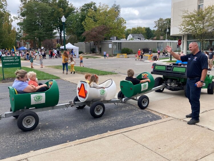 Kids who attended Pumpkinfest enjoyed having their faces painted, climbing on inflatables, riding a barrel train, and playing a variety of fall yard games, including bowling with pumpkins.