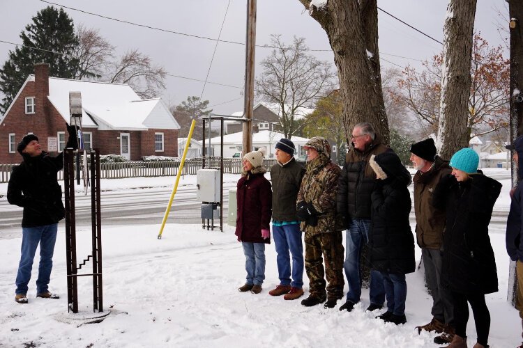 The Rhem family dedicates a sculpture it donated to the Lakeside Trail.