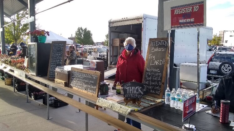 Linda Engel, Julie's mom, staffs the farm's stall at the Muskegon Farmers Market.