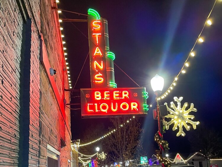 Trees and shops along Savidge St. lit up with Christmas lights for viewers to walk or drive by to enjoy. (Brittany Meyers)