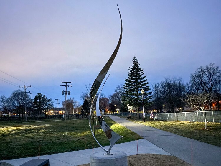 The butterfly sculpture was commissioned in honor of Kay Doss and donated to the Village of Spring Lake by the Doss family. The Dosses decided to relocate the sculpture so all could enjoy it.