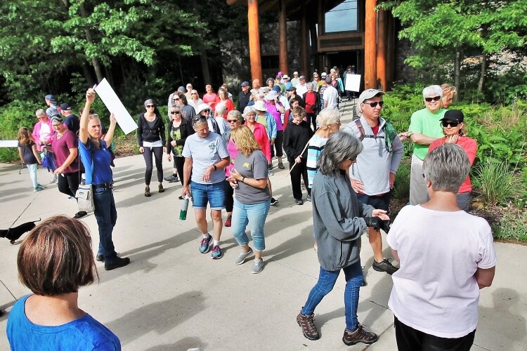 Individuals and families can participate in group walks to explore county parks they haven't visited before.