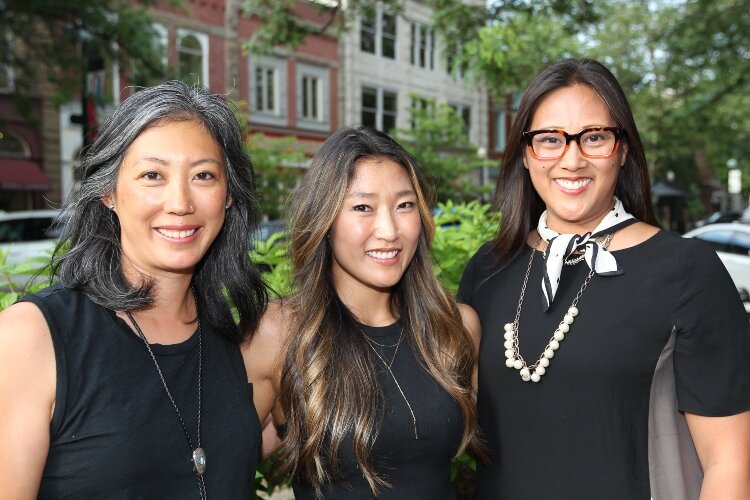 Women of Color Give members Kim Koeman, Rebekah Bakker and Robyn Afrik.