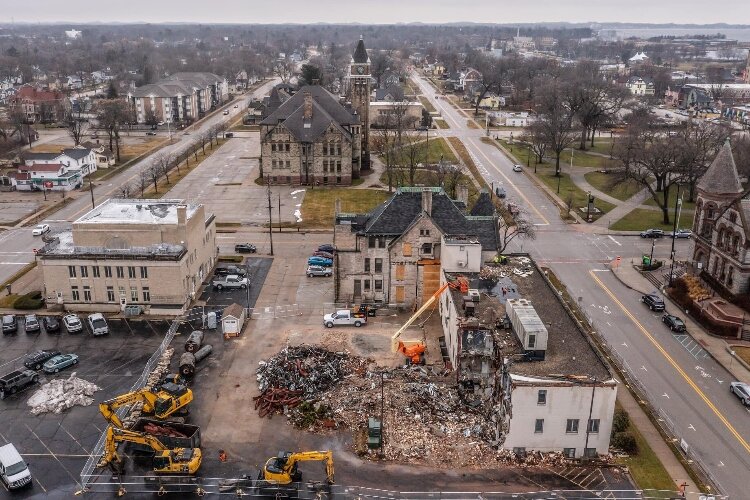 Aerial view of demolition work of the ormer Community Service Building. (GMED)