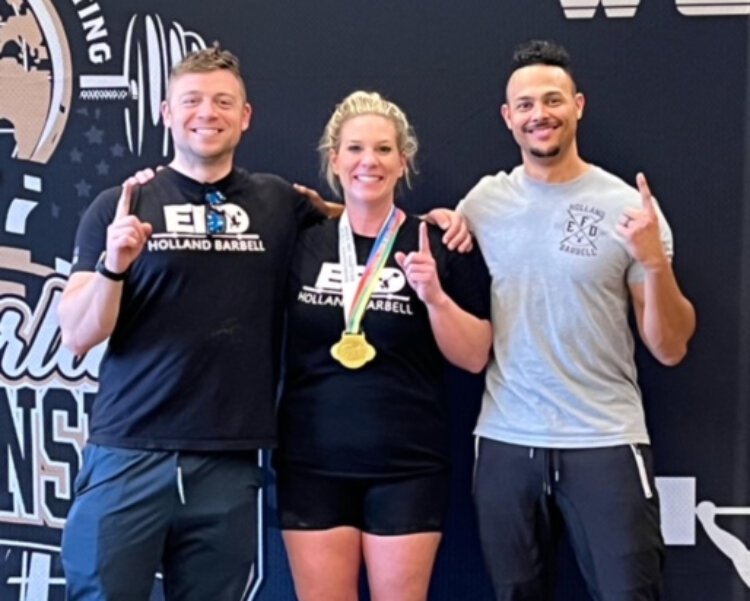 Traci Gonzales celebrates her International Weightlifting Federation championships win.