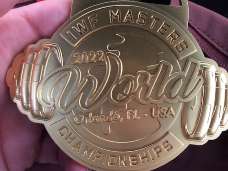 Zeeland teacher Traci Gonzales brought home the gold from the International Weightlifting Federation championships.