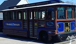 When Grand Haven decided to sell its aging trolleys, the local businesses bought them with ideas for giving them a new way to serve the community.