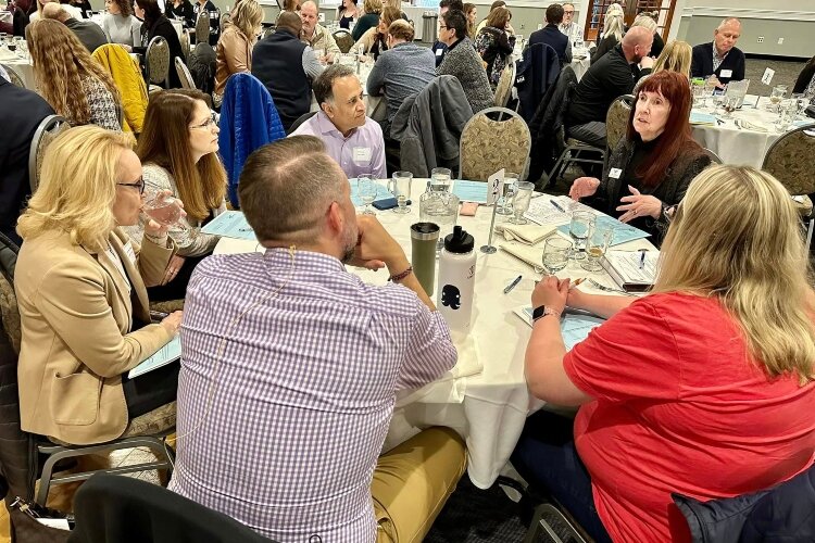 Chamber President Joy Gaasch speaks during table discussion portion of the Tuesday Forum. (GHACF)