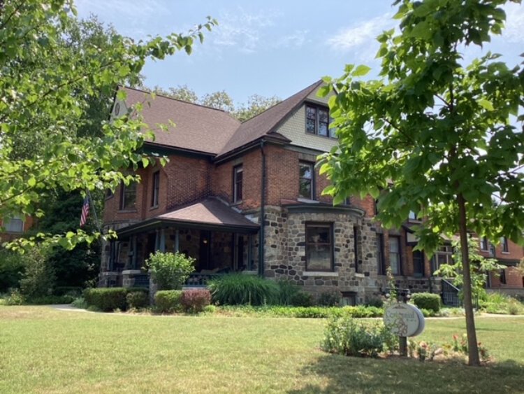 Local bricks, Michigan fieldstone and Dutch masonry skills came together in one of Holland’s historic homes that later served as the first community hospital, a college fraternity house, a museum, and most recently a bed and breakfast.