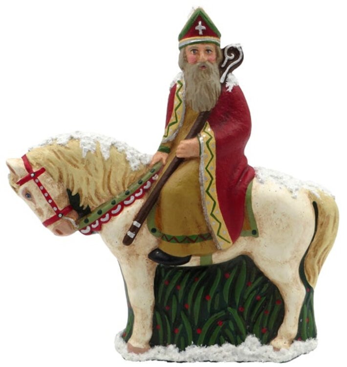 St. Nicholas, known as Sinterklaas, rides a horse in the Netherlands. Papier mache figure made by Susan Brack, Liberty, Indiana, from a German Anton Reiche chocolate mold dated around 1930.