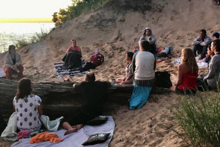 Yoga instructor Julia Fisher is passionate about the physical and mental benefits of yoga. She’s helping people find connection through yoga at several lakeshore studios.