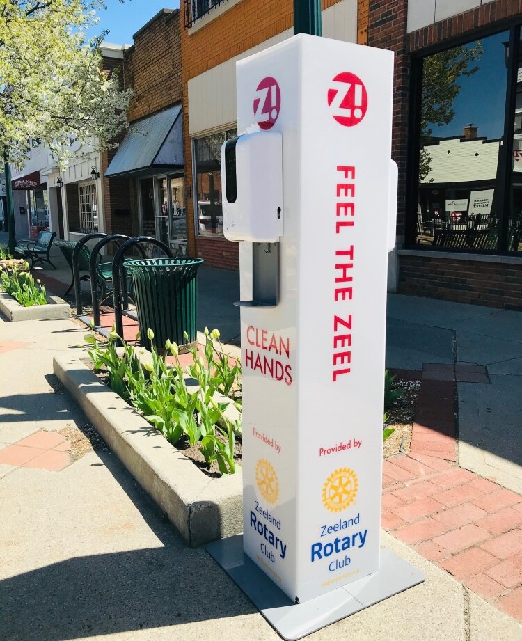 Two outdoor hand sanitizing stations have been placed in high-traffic areas along Main Street