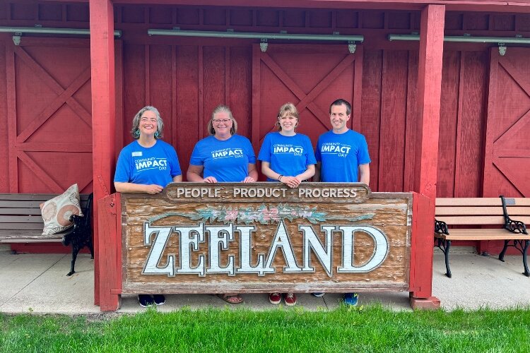 Chamber members volunteer at the Zeeland Historical Society during Community Impact Day. (West Coast Chamber)